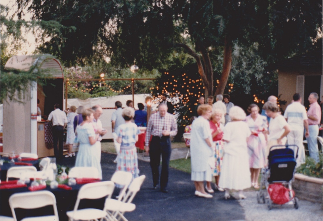Guests mingling under the lights